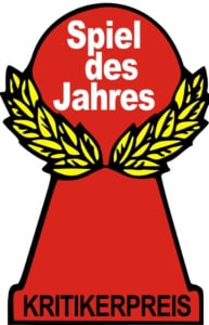 Spiel des Jahres -logo: punainen pelinappula, jolla on keltainen laakeriseppele.