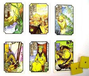 Four Dragonsin kortteja. Kuva: John Carlton