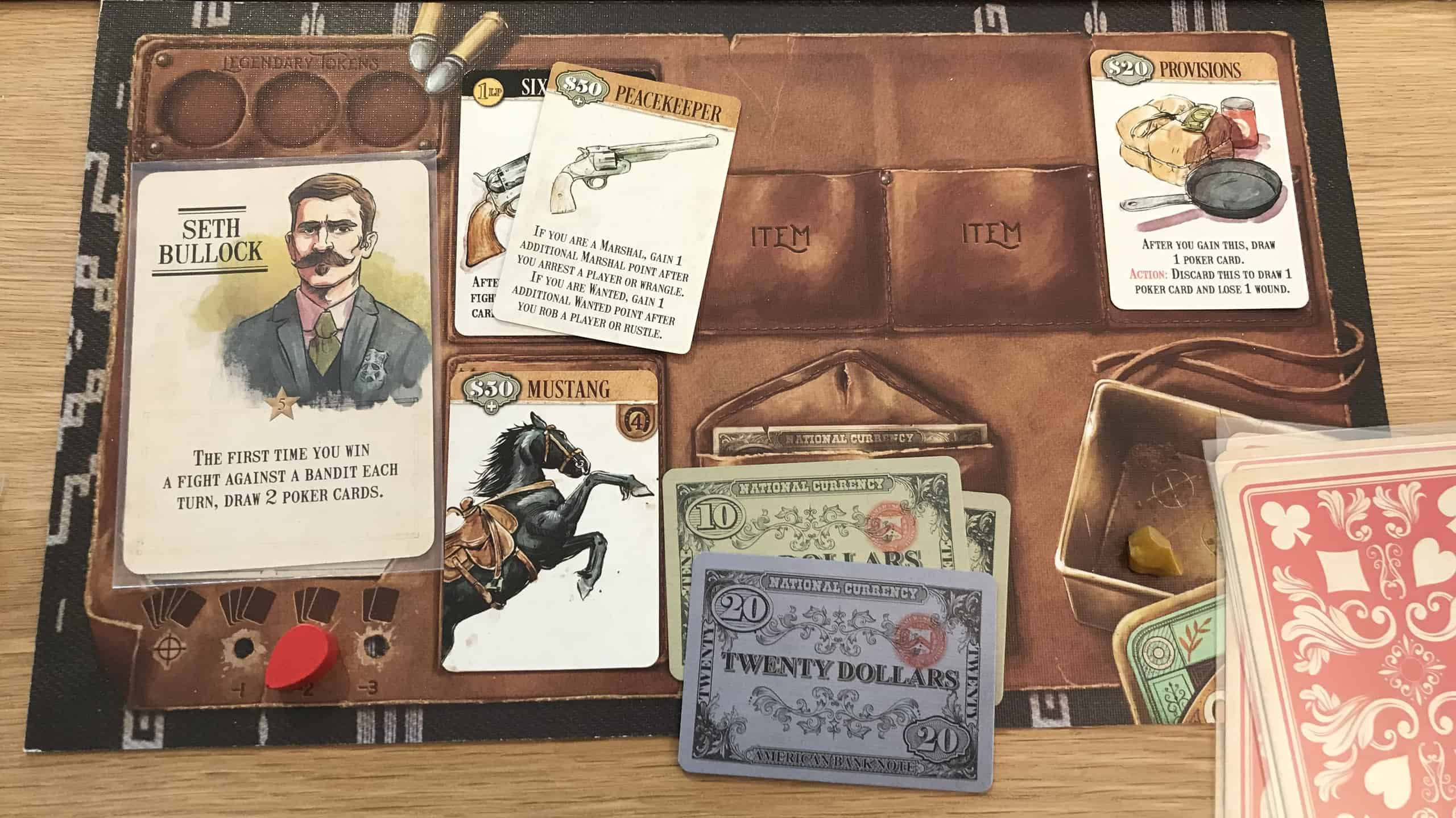 Pelaajalauta: Seth Bullock -hahmo, Mustang-kortti, aseita, ruokaa ja rahaa.