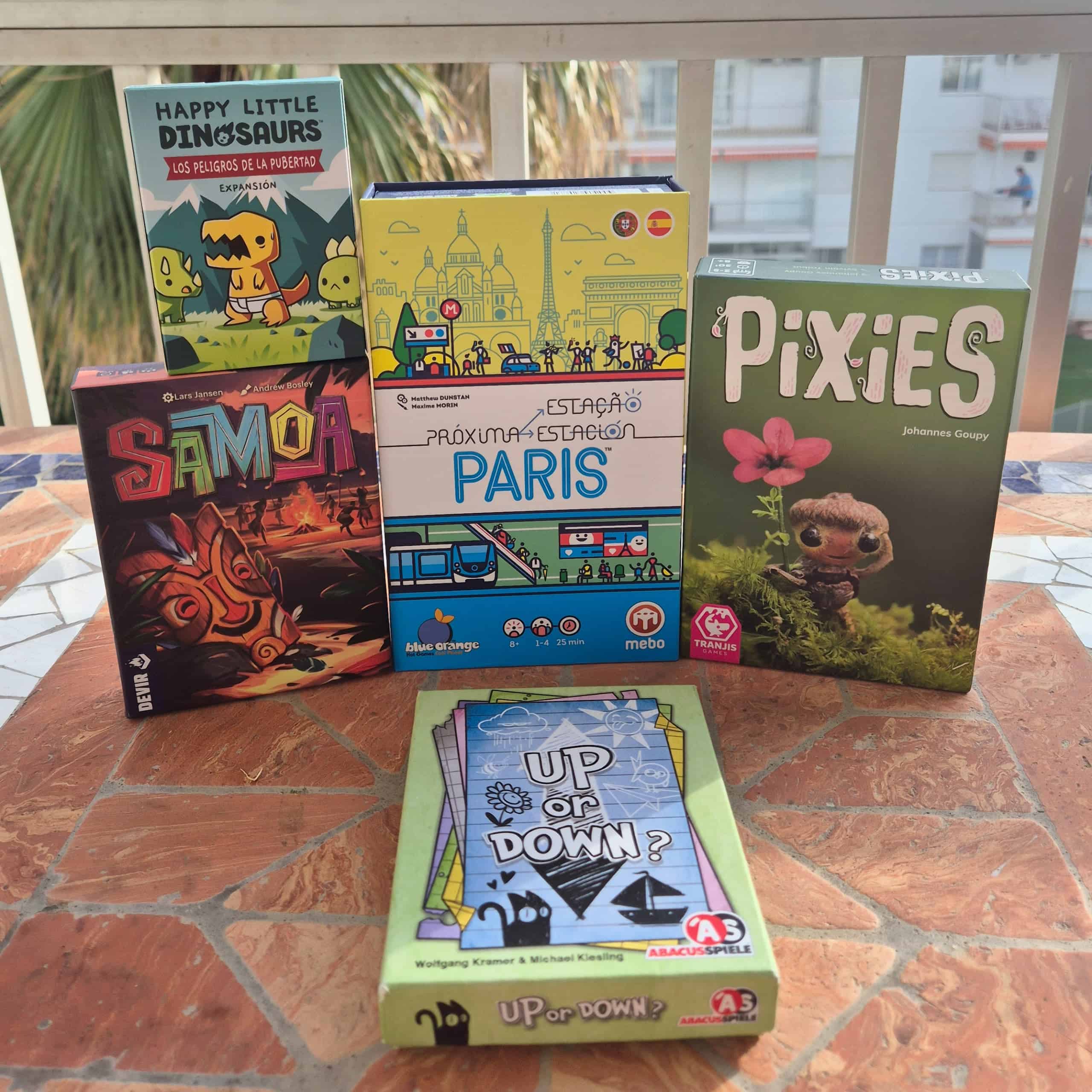 Pelilaatikoita pöydällä: Samoa, Next Station: Paris, Pixies, Up or Down ja Happy Little Dinosaurs: Los Peligros de la Pubertad.