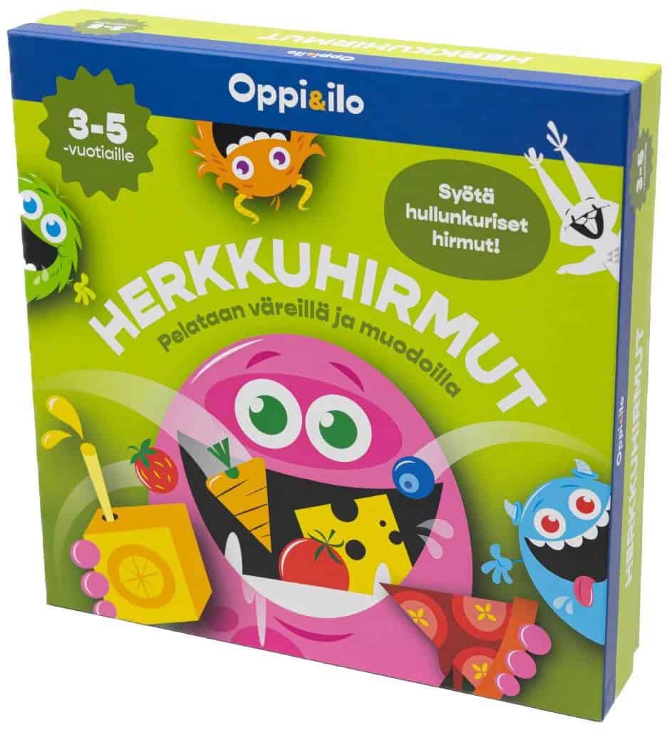Herkkuhirmut-lautapelin kannessa on piirros vaaleanpunaisesta pallerosta, jonka isoon kitaan lentää erilaisia herkkuja.